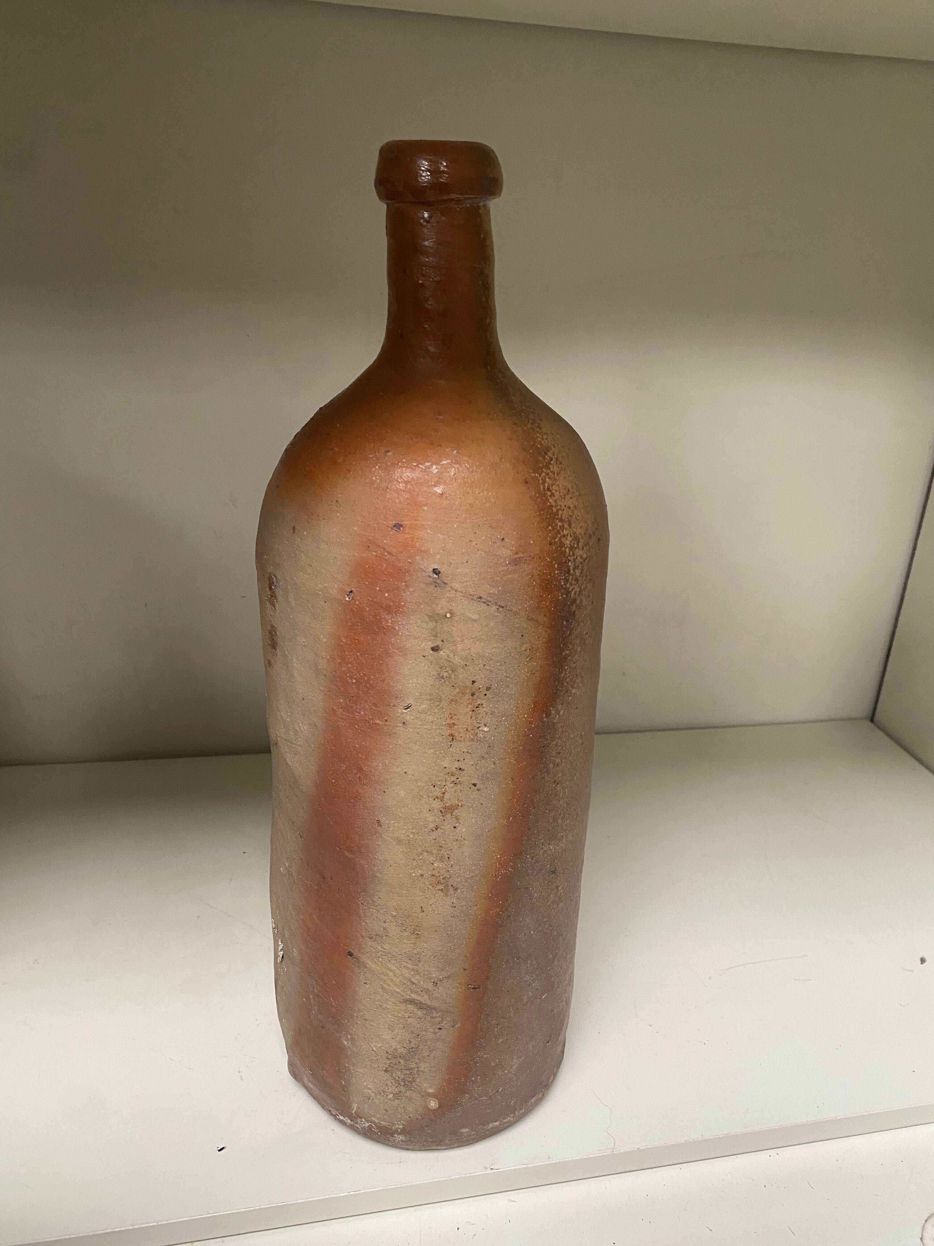 Old sandstone bottle