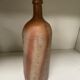 Old sandstone bottle