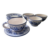 Set of 4 white/blue ceramic cups and saucers.