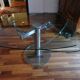 Glass and stainless steel dining table with 2-length system