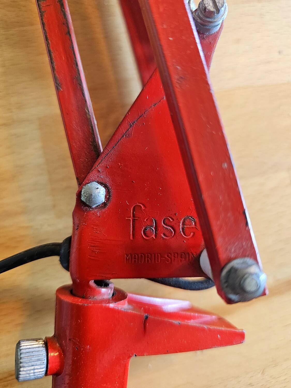 Red articulated workshop lamp