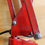 Red articulated workshop lamp