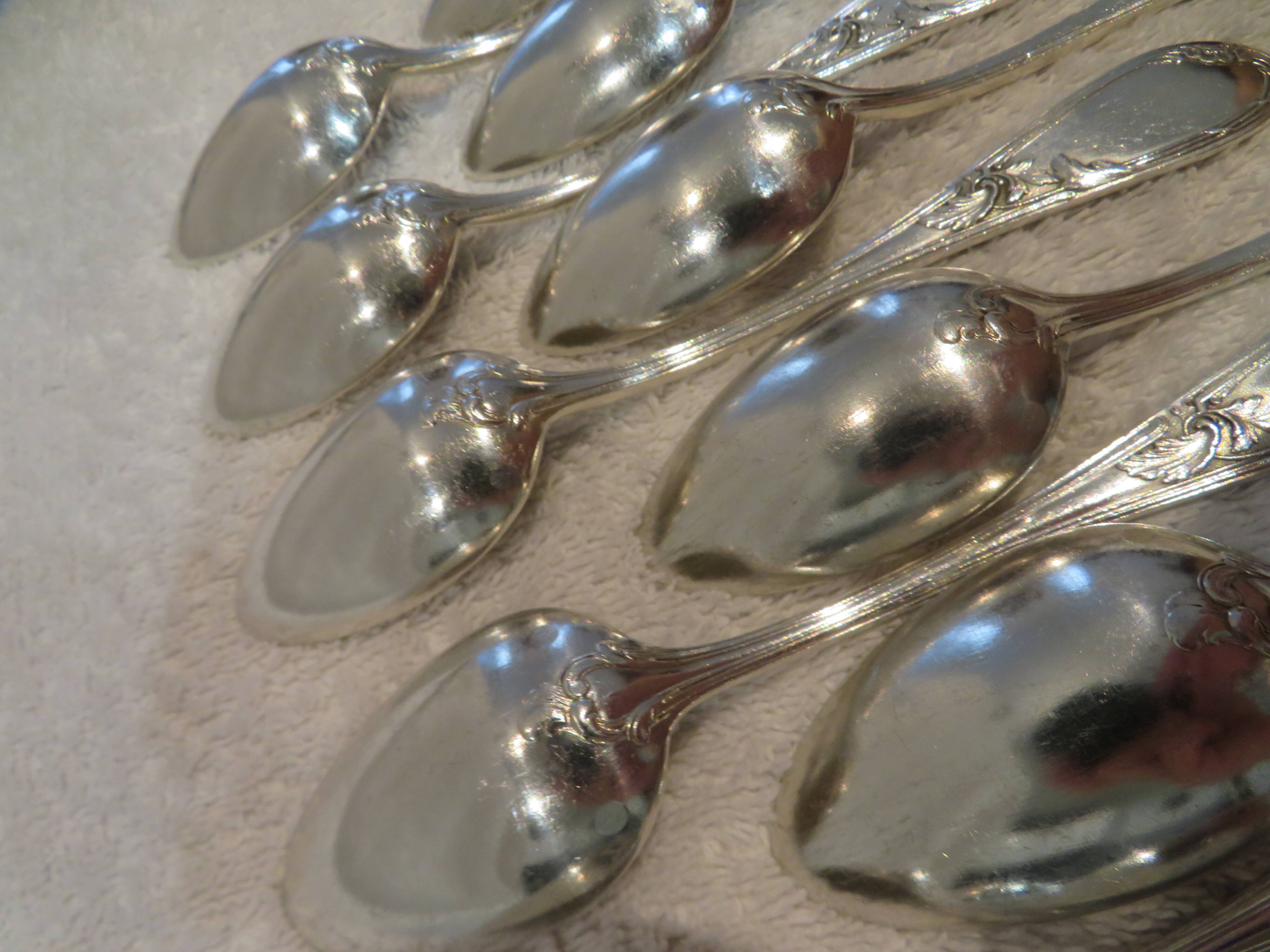 12 silver-plated metal teaspoons, goldsmith J Brille, rocaille ribbon decor