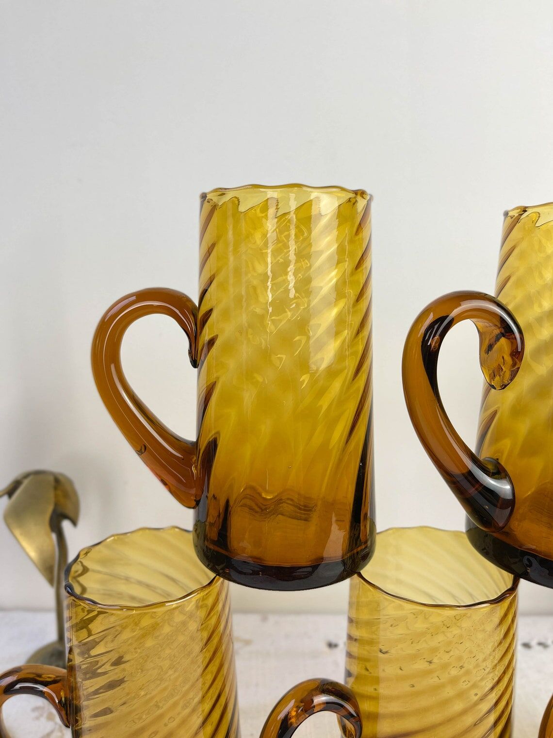 Set of 5 vintage beer glasses in amber twisted glass