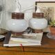 Pair of pendant lights with white glass shades from the 1950s.