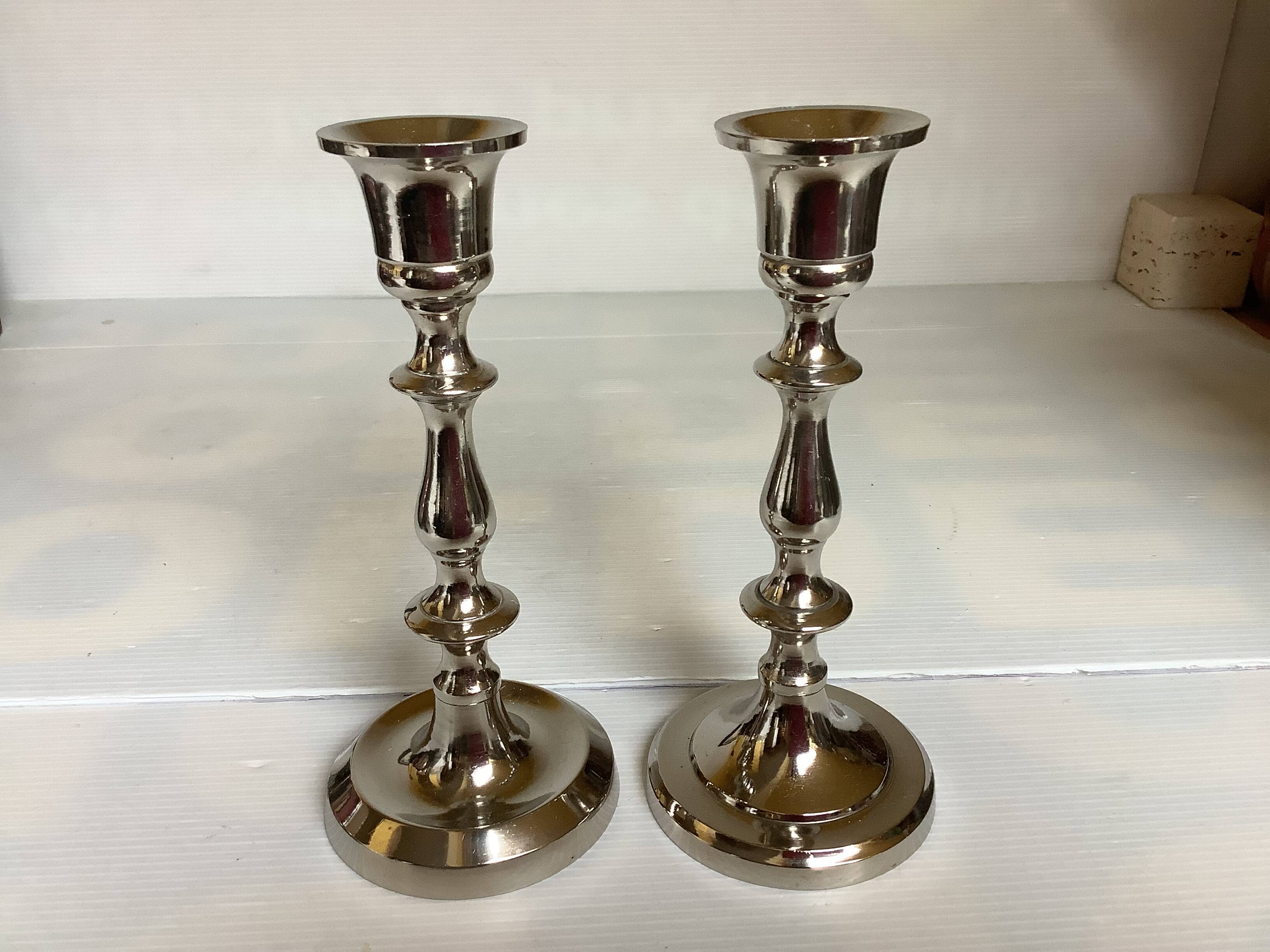 Pair of silver metal candlesticks