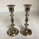 Pair of silver metal candlesticks