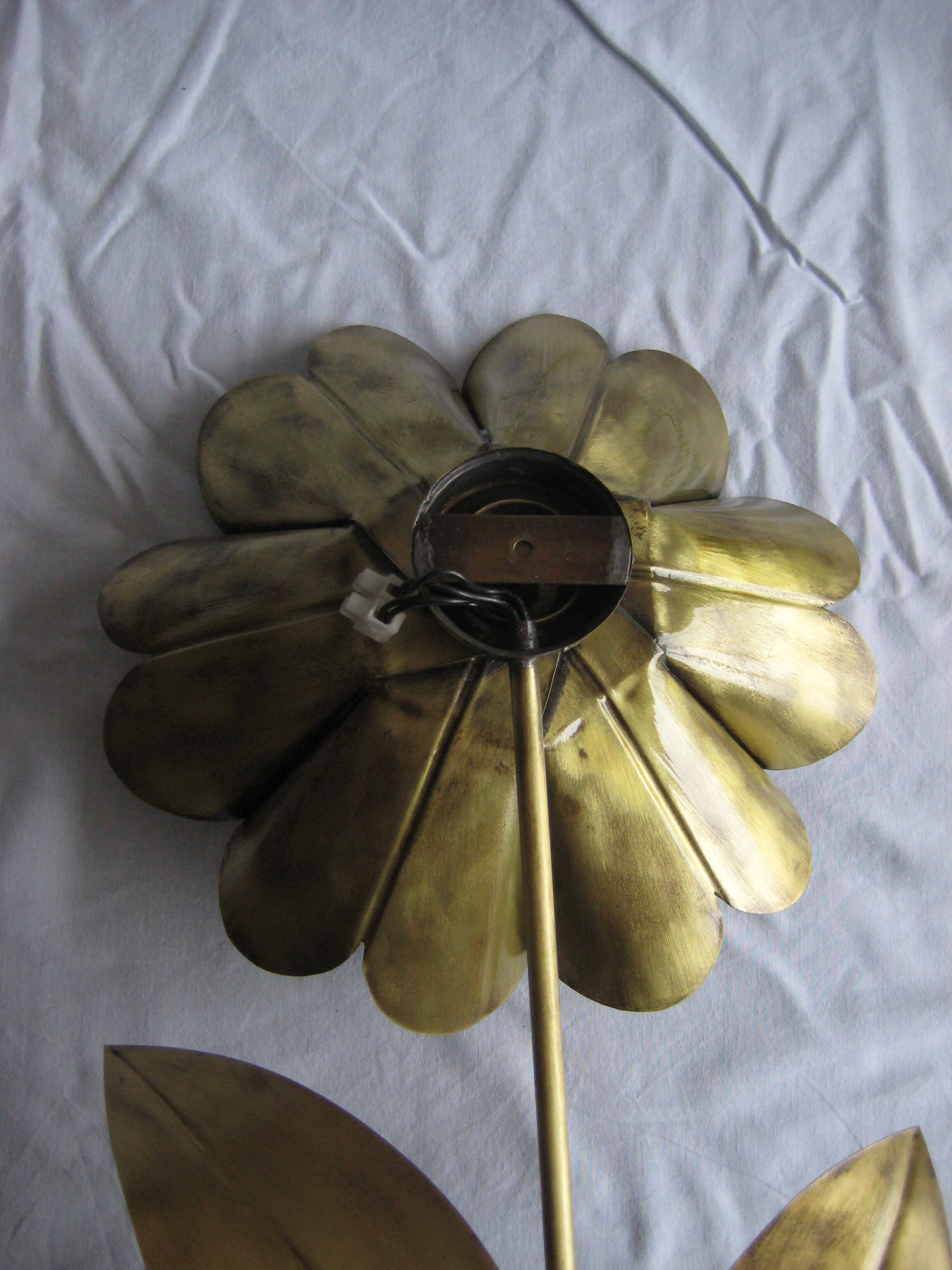 Brass sunflower sconces