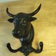 Wall-mounted coat hook in cast iron, bull's head and Camargue cross