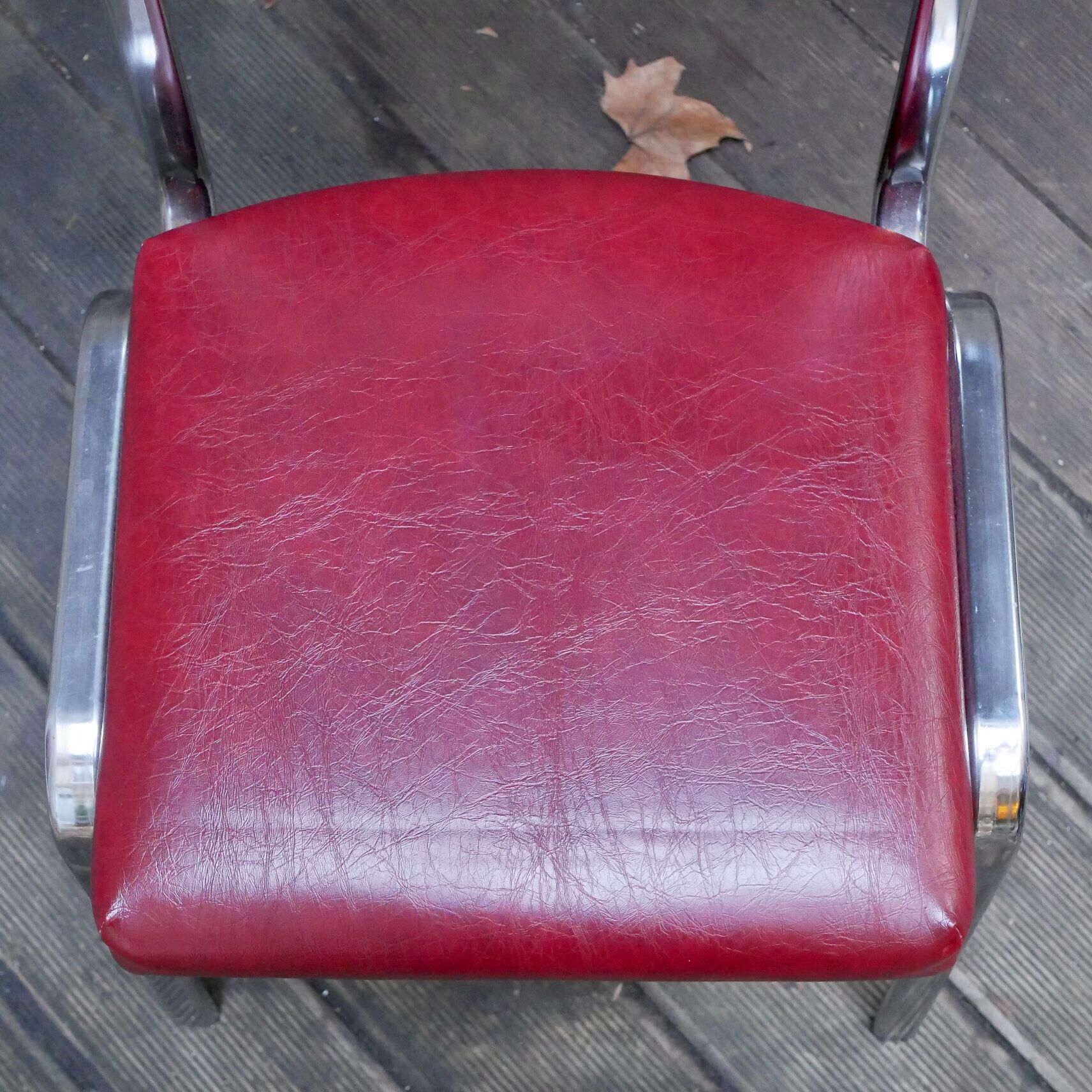 Pair of red leatherette chairs