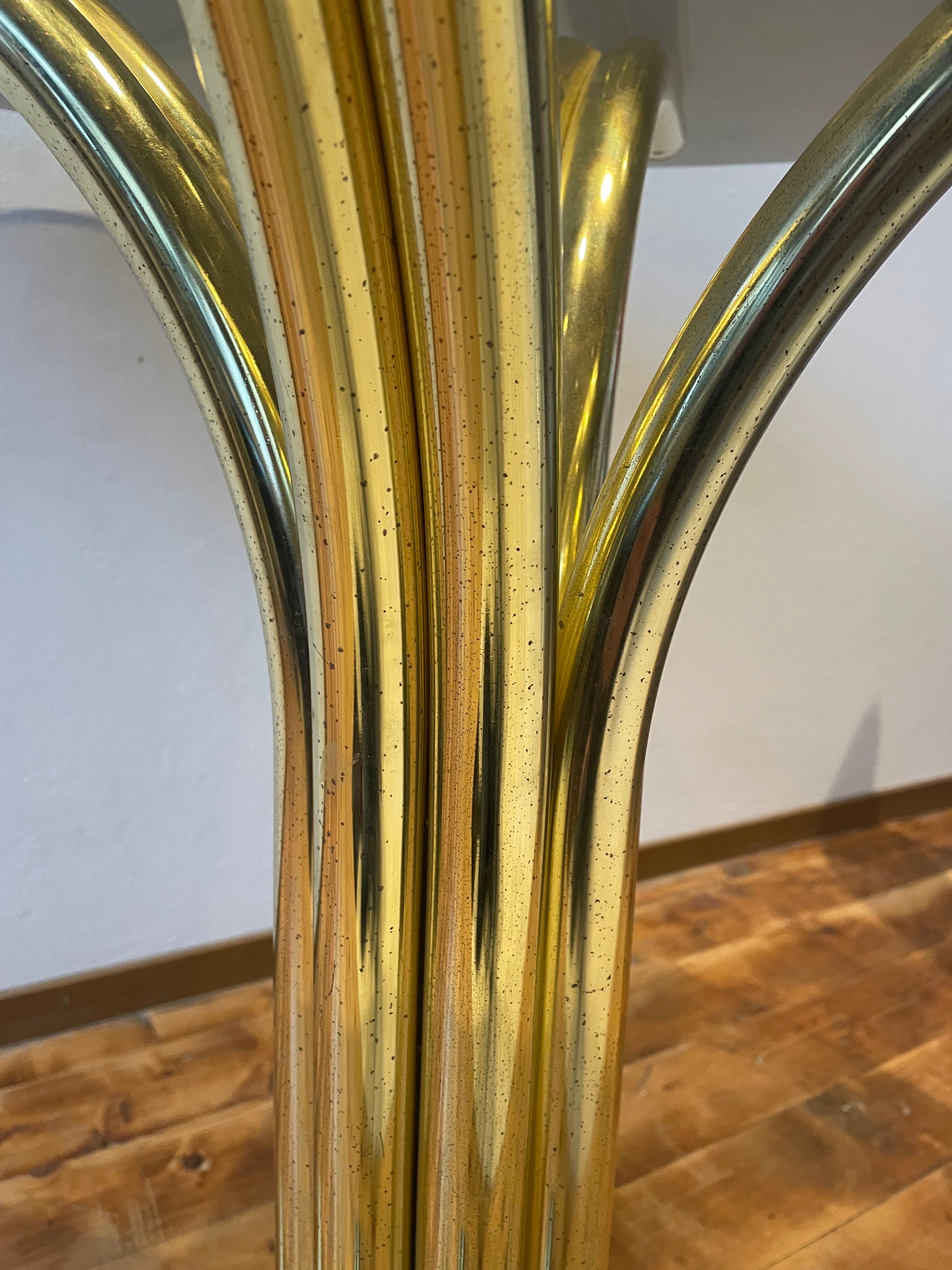 Table seventies pieds dorés