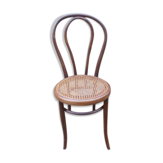Curved wooden bistro chair and canning