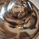 Ancient samovar tea fountain in silver metal