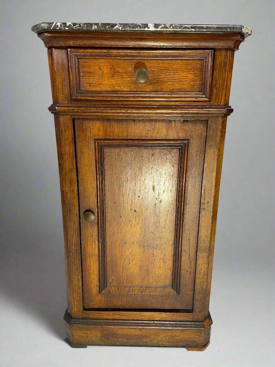 Provincial antique bedside table in oak, marble top, late 19th century.