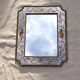 50s Eglomisé glass mirror with musical instrument decor
