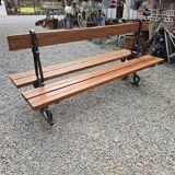 Antique double garden bench from the city of Paris in cast iron and wood