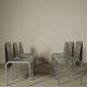 Set of six postmodernist stainless steel dining chairs from circa 1980-1990.