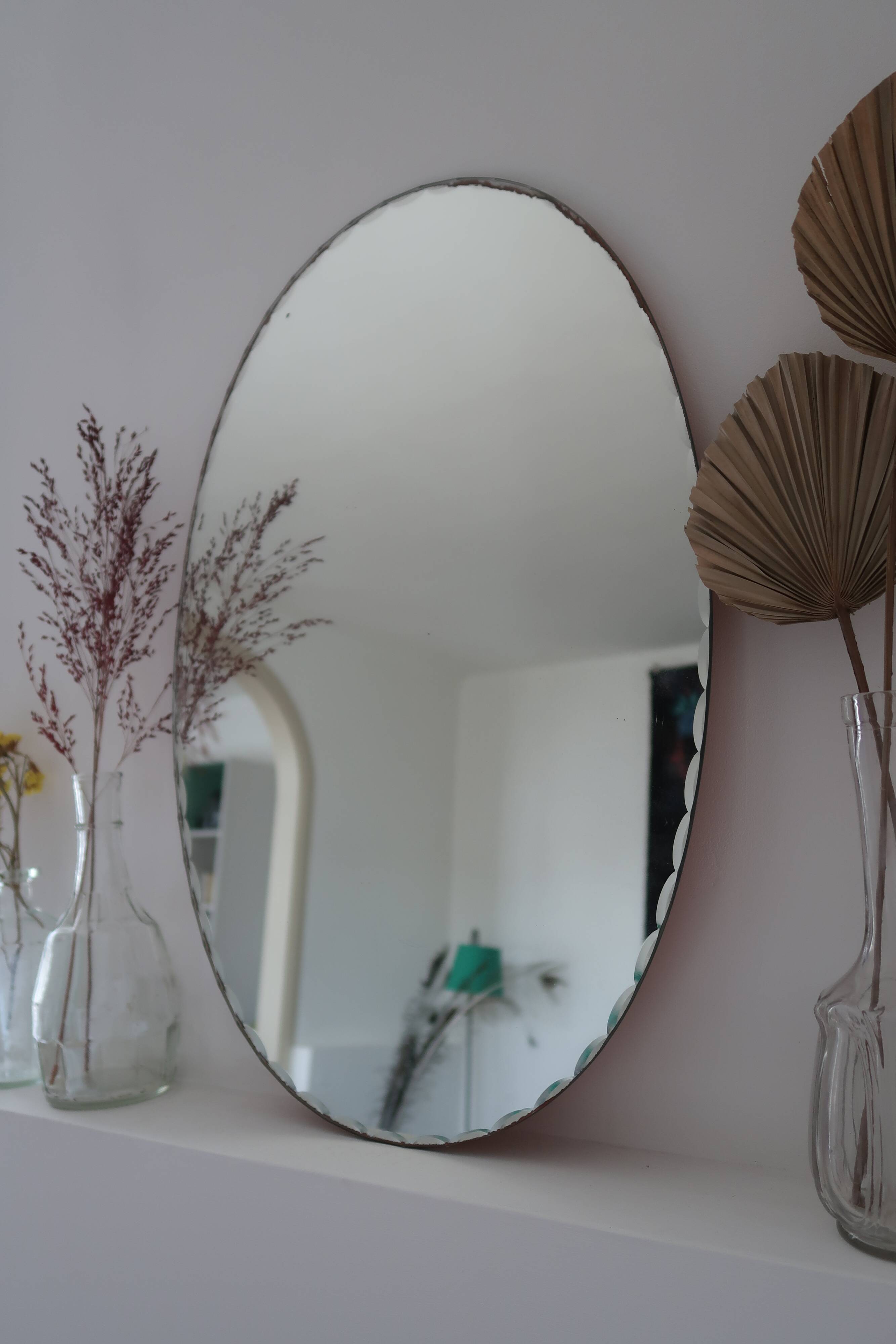 Vintage bevelled oval mirror