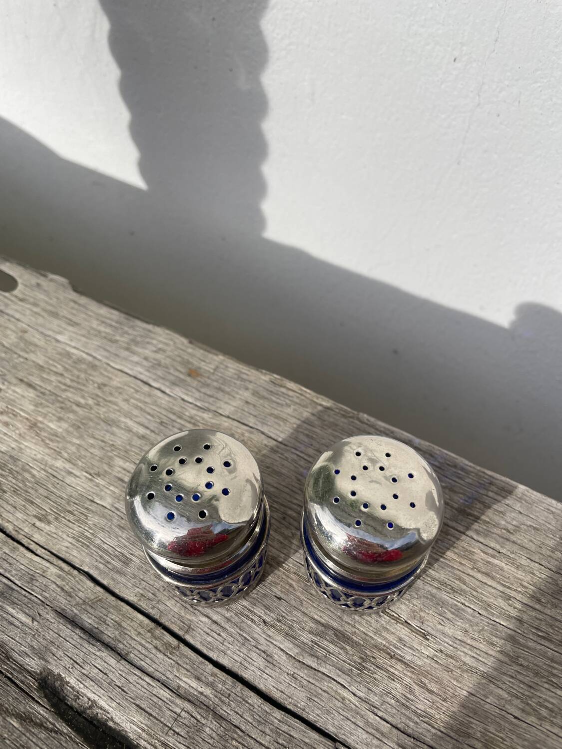 Silver-plated metal and blue glass salt and pepper shaker