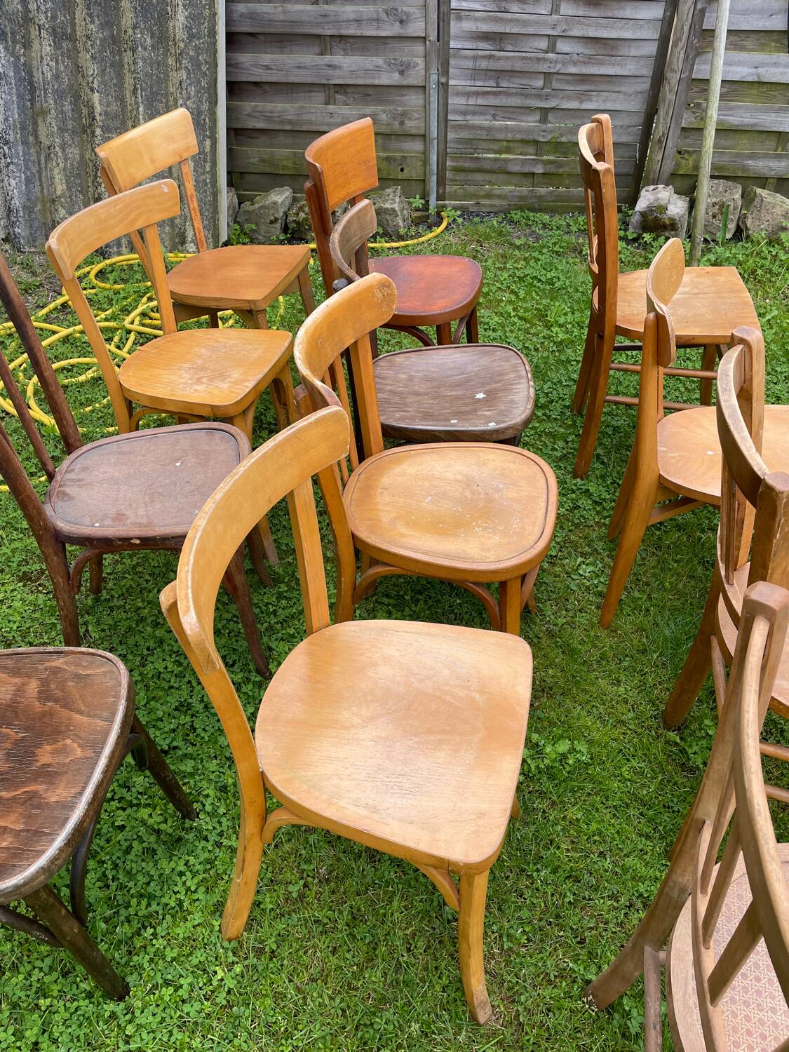 Lot of 16 mismatched bistro chairs