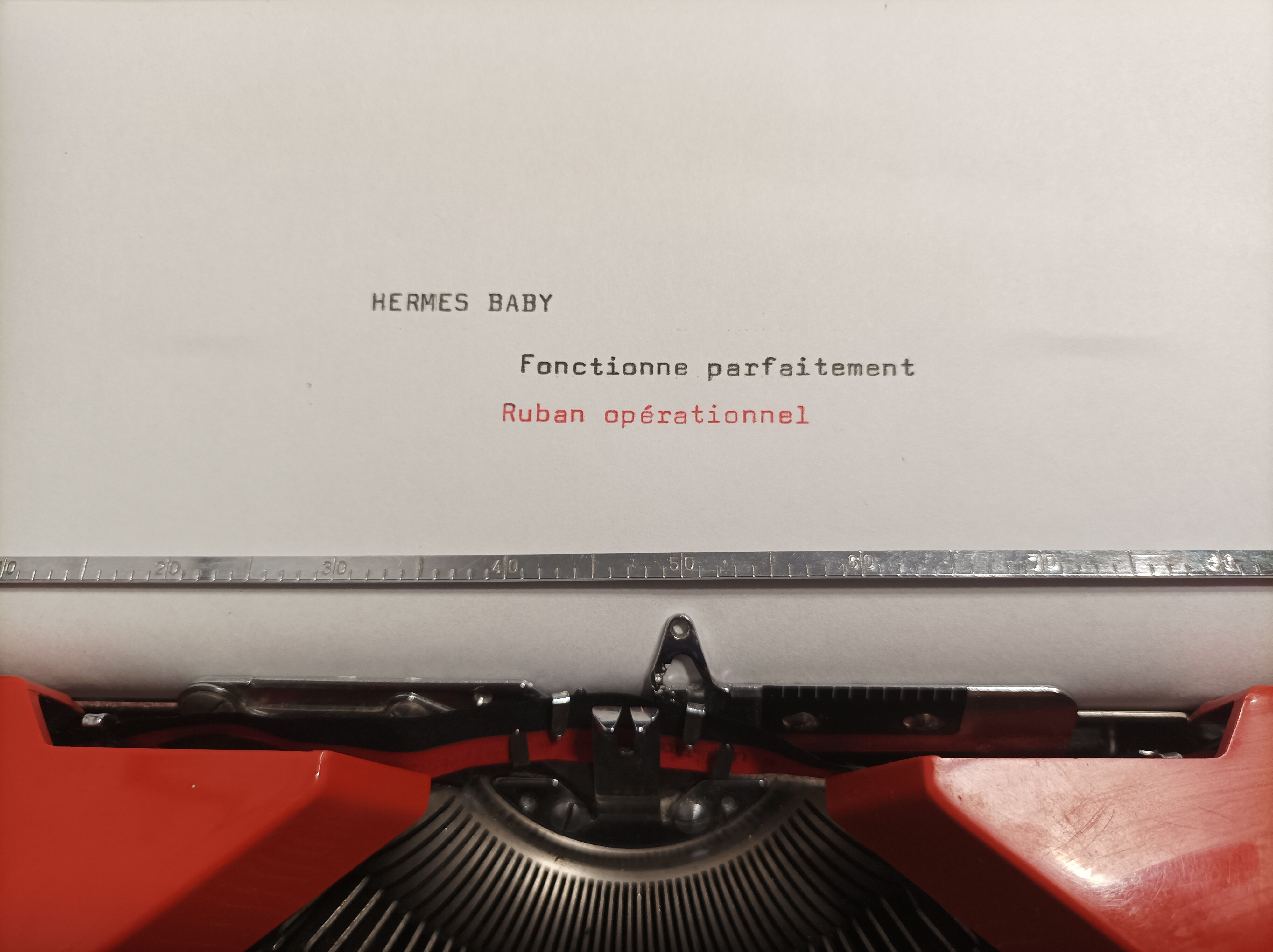 Hermes baby orange typewriter