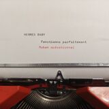 Hermes baby orange typewriter