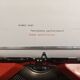 Hermes baby orange typewriter