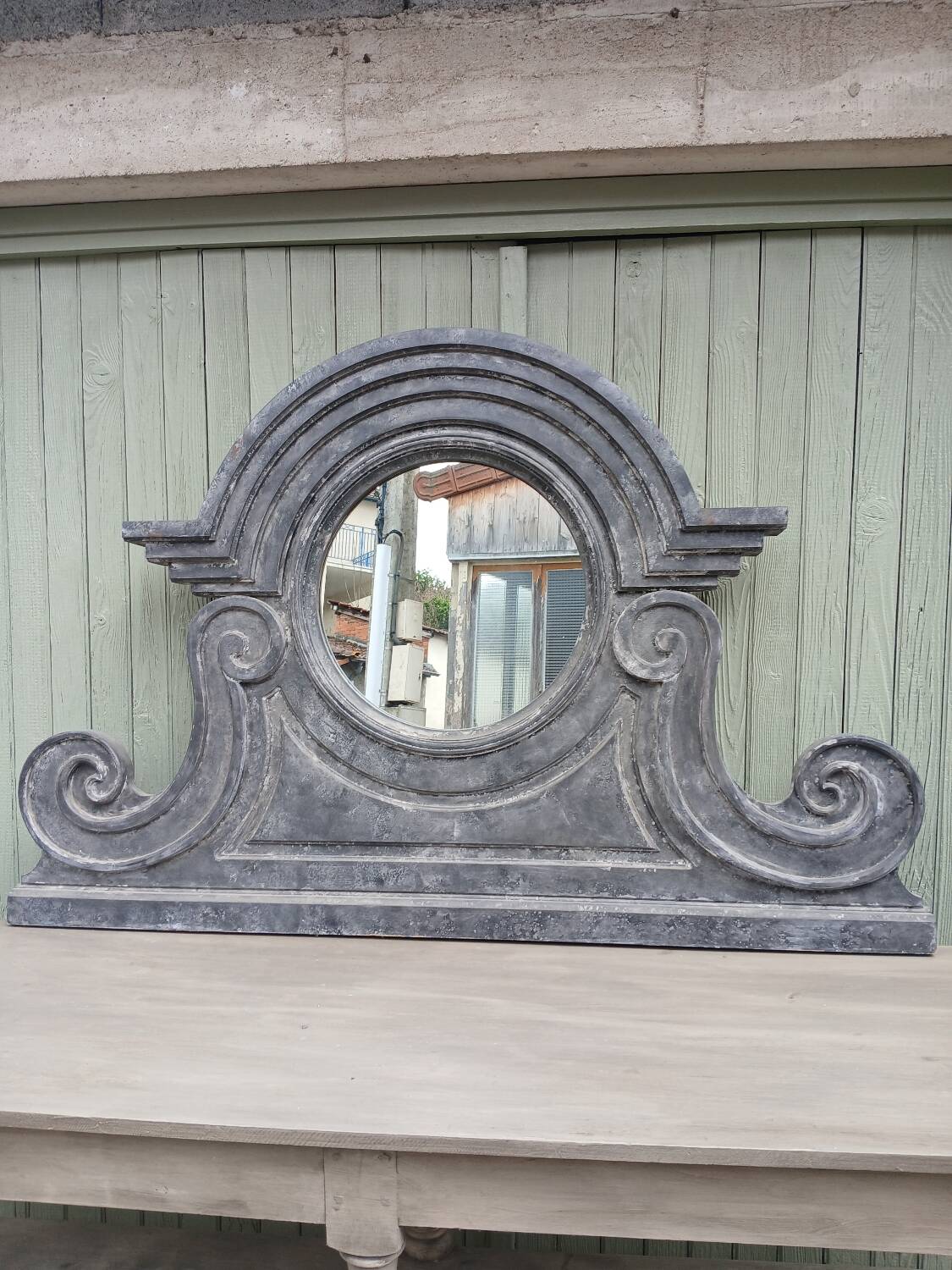 Wooden bull's-eye mirror
