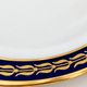 Saint-Amand Fribourg table service in midnight blue and gold, 45 pieces.