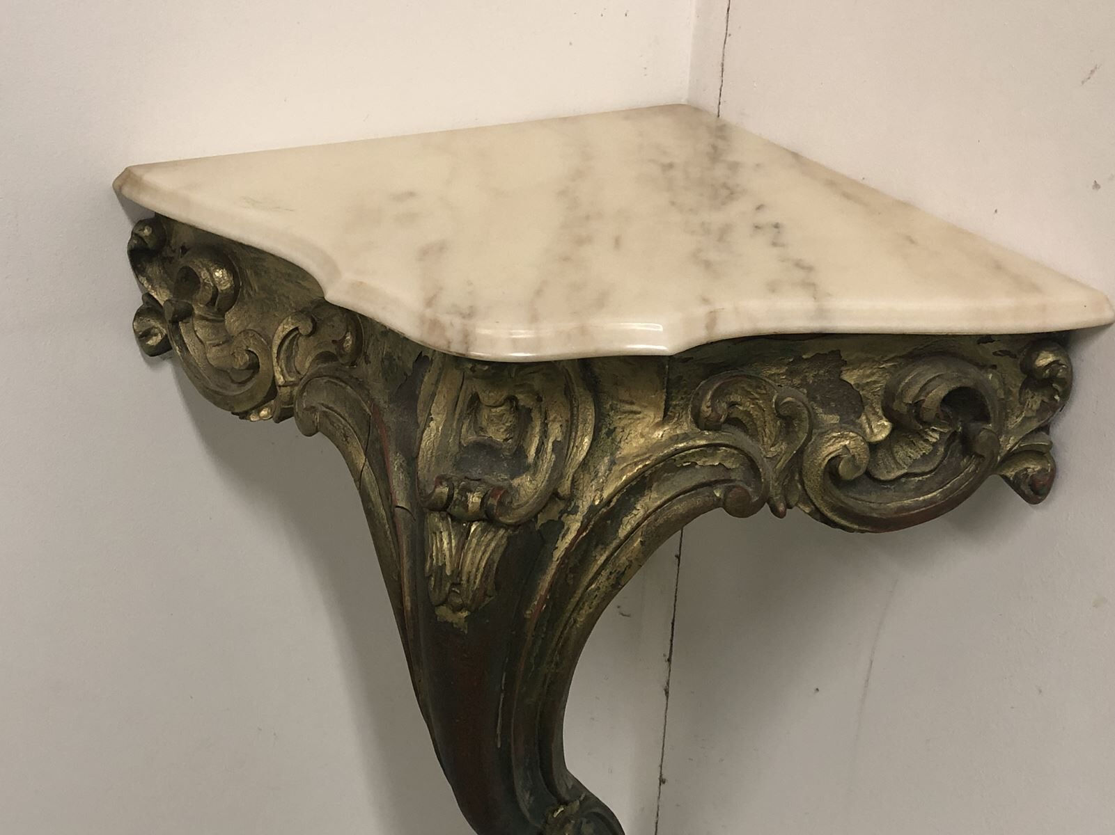 Small Louis XV-style corner console in gilded wood and marble
