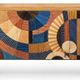 A beech wood Art Deco sideboard with polychrome marquetry.