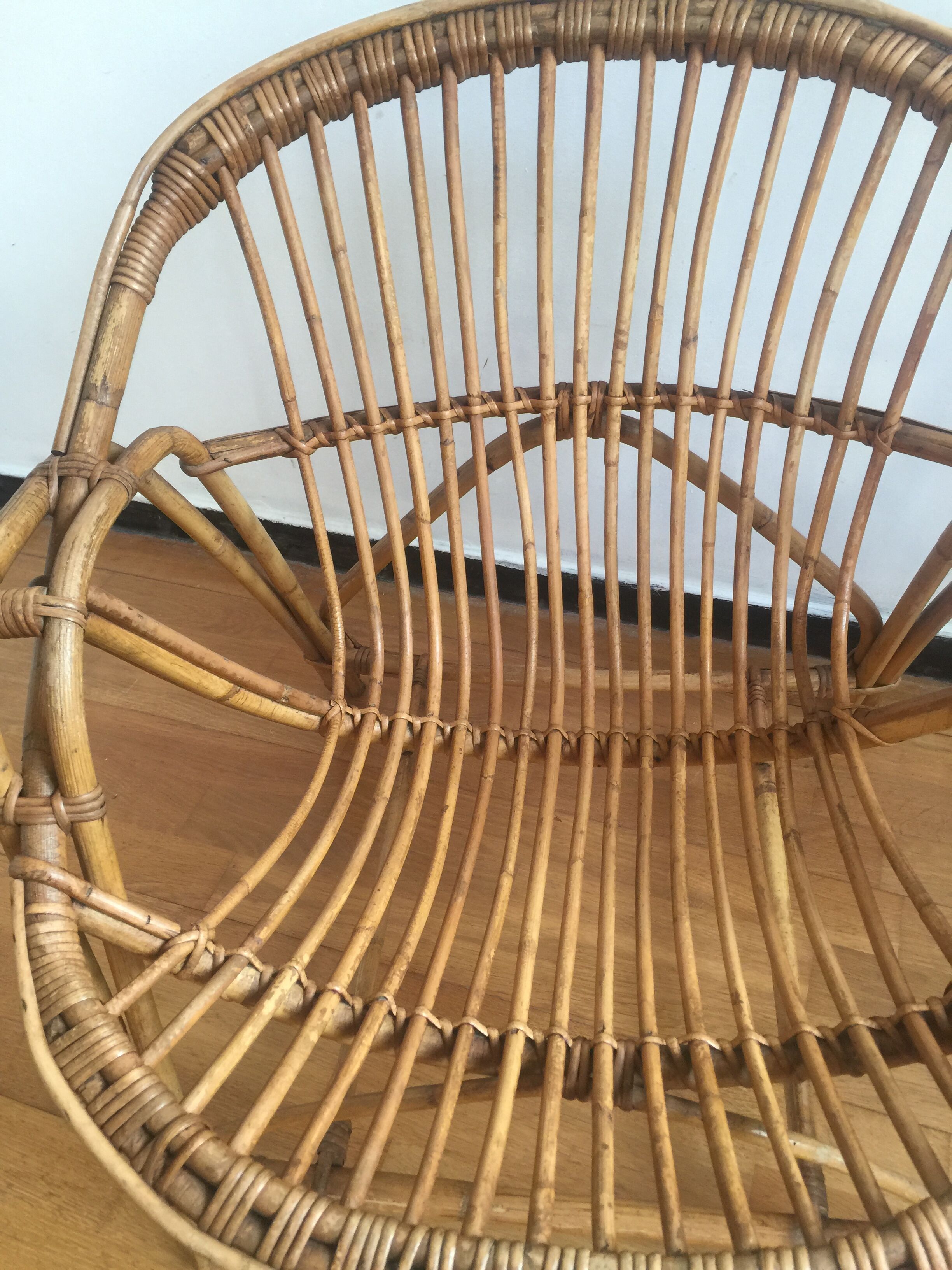 Shell rattan armchair