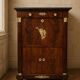 Rare four-column secretary from the Empire period in flame mahogany and bronze.