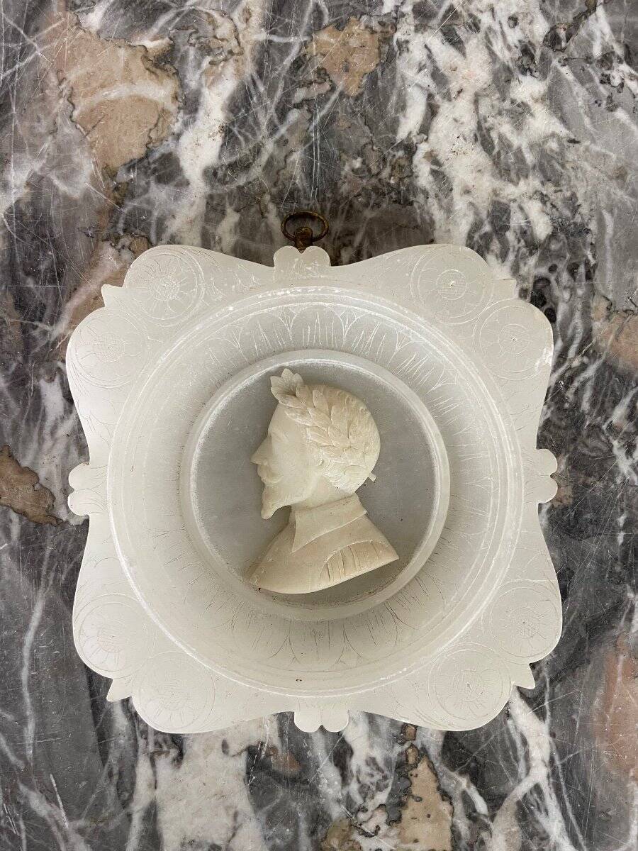 Three alabaster profiles of men, Italy around 1880