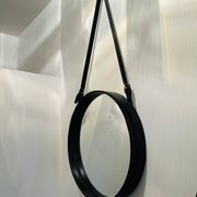 Jacques Adnet circular leather and brass mirror