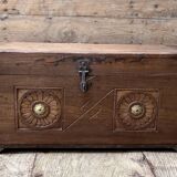 Teak chest from Burma with carved rosettes.