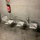 Lot of three vintage tubular armchairs from the 70's