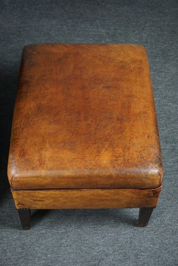 Armchair + sheepskin pouf