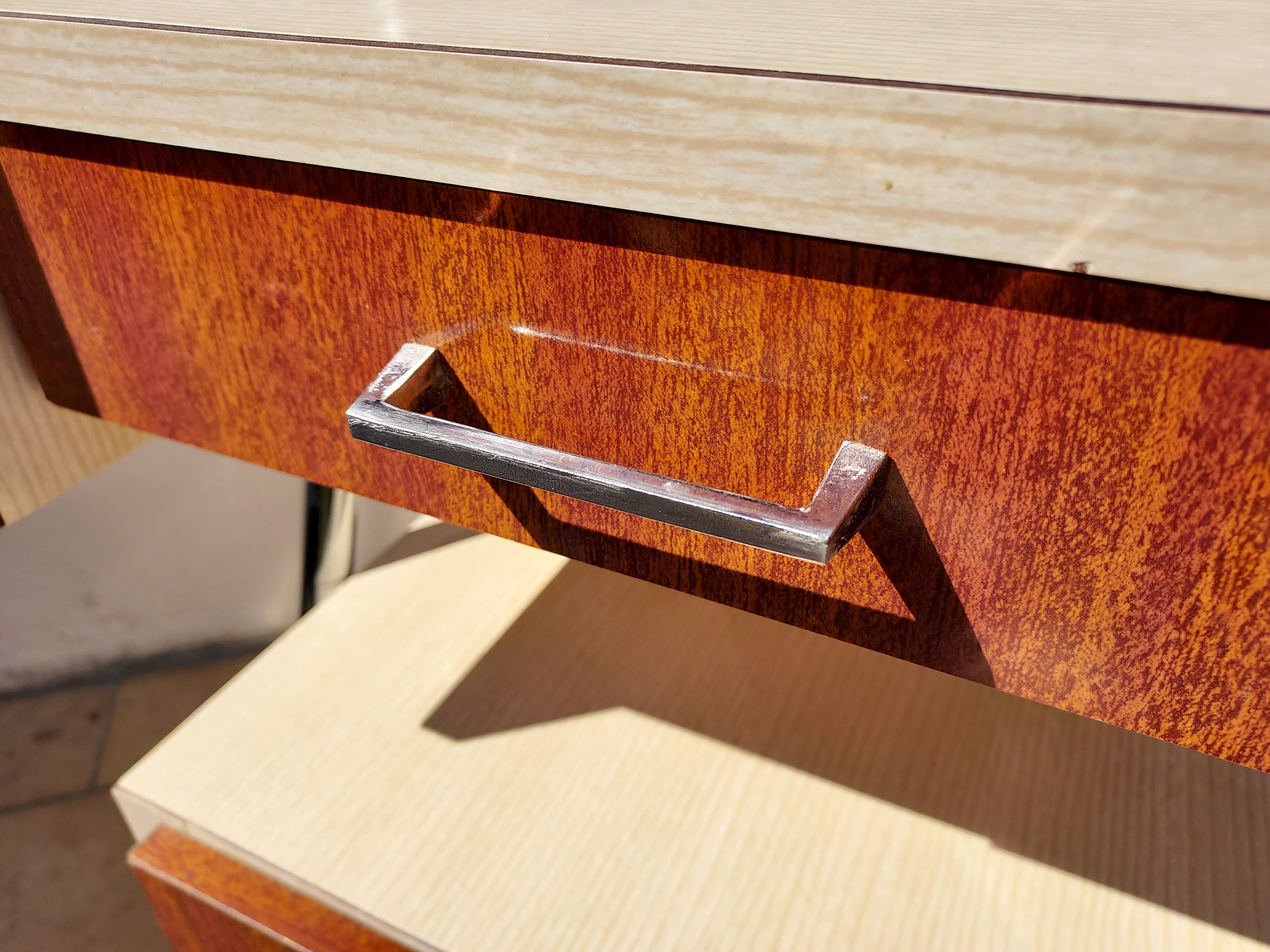 Pair of chrome boarding bedsides