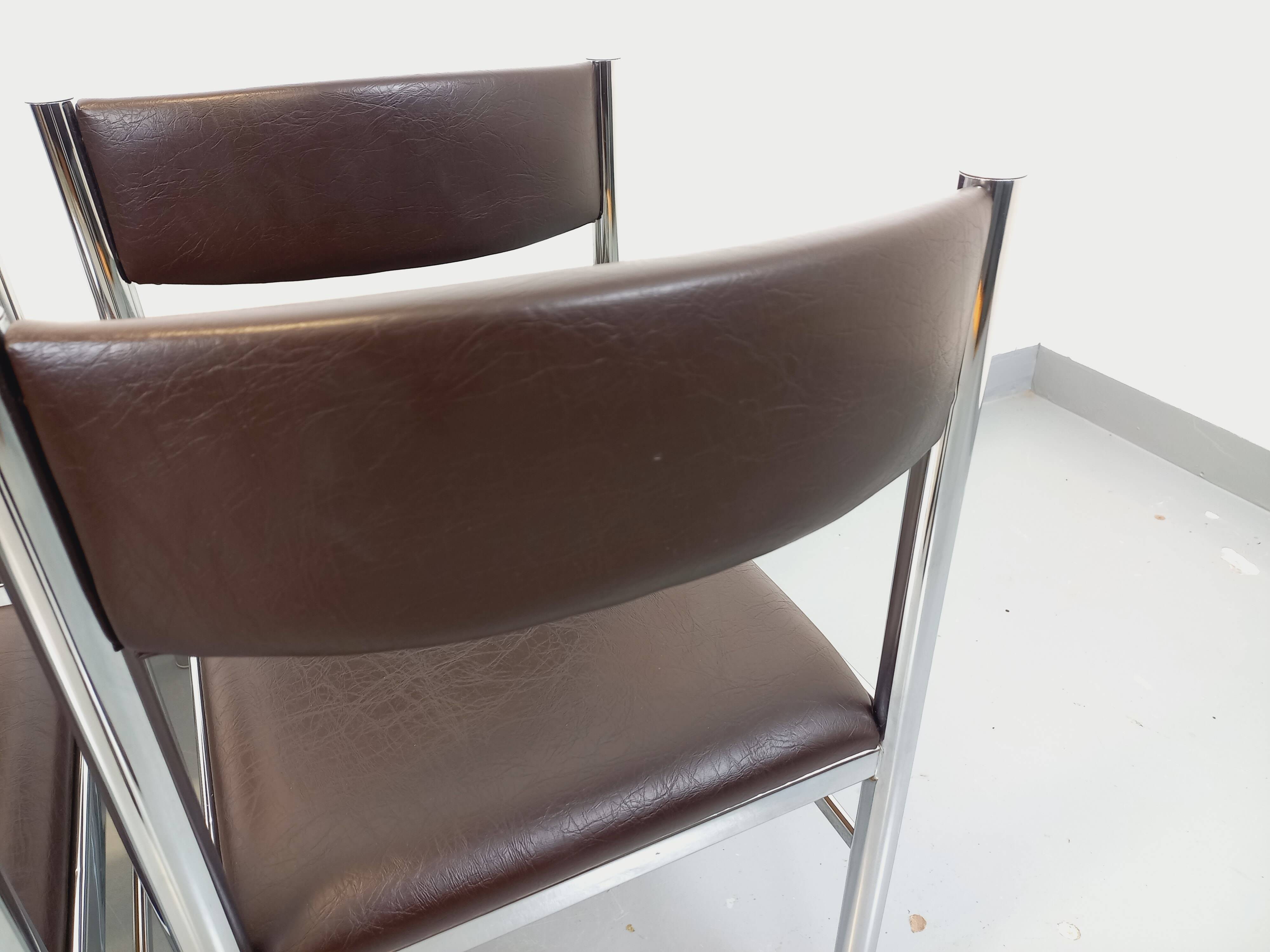 Set of 6 vintage chairs from the 70s in chrome metal and brown faux leather.