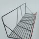 Vintage wall shelf made of metal wire