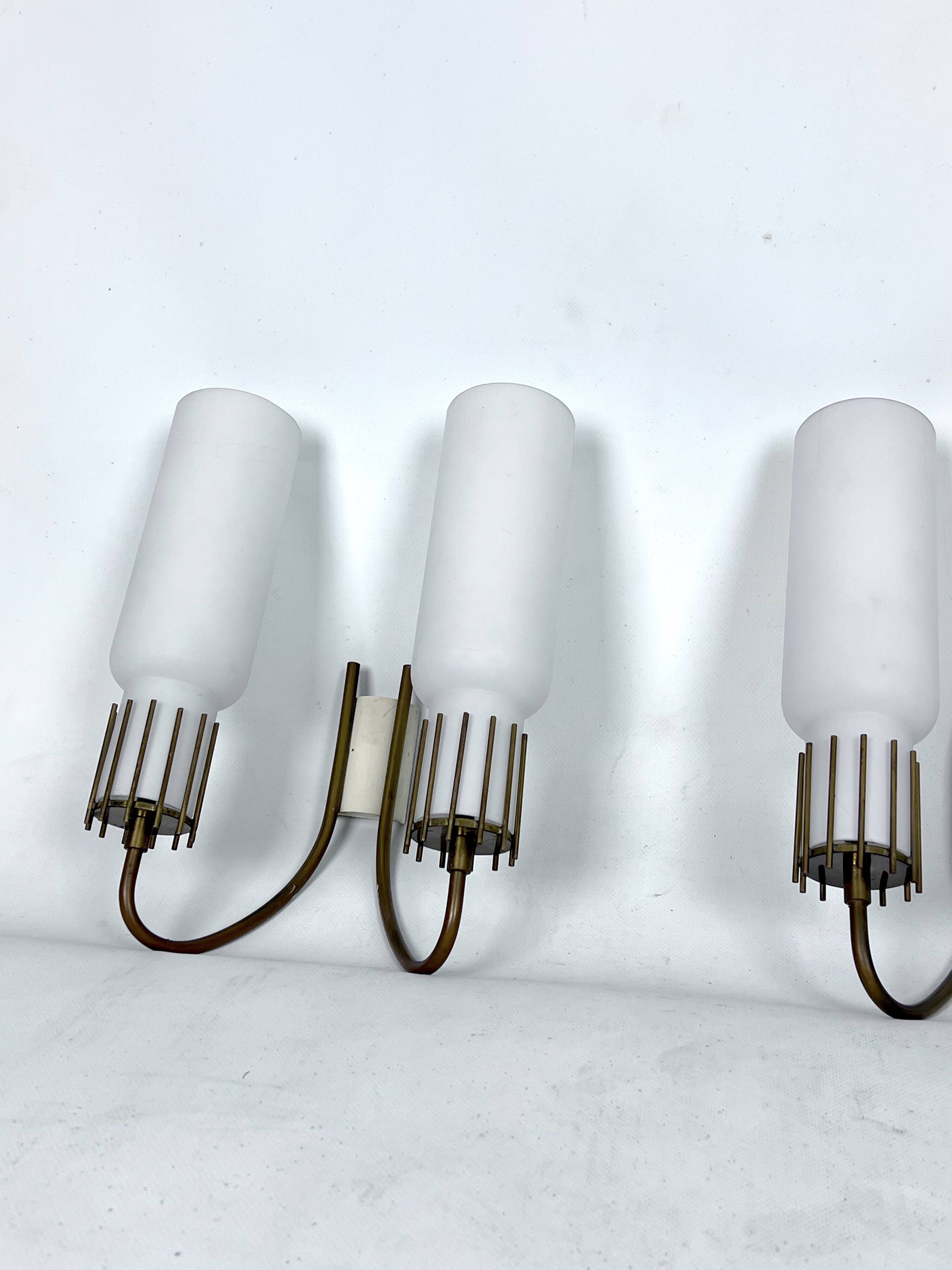 Mid-Century Modern set of three sconces in Arredoluce style. Italy 1950s