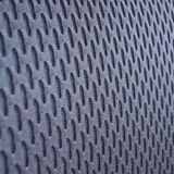 Vitra ID Trim office chair by Antonio Citterio — black mesh backrest and blue fabric seat, aluminium frame.