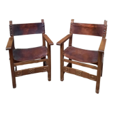 Pair of medieval leather style armchairs
