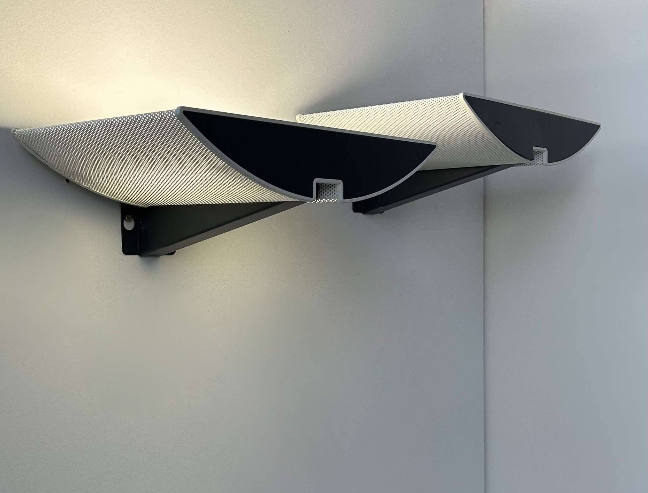 Pair of modernist wall lights, black and white lacquered metal, Italy 1980