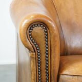 Set of 2 sheep leather club chairs in a cognac color