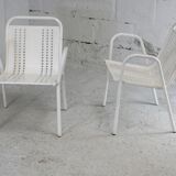 Pair of honeycomb steel armchairs. France, circa 1950.