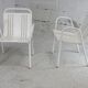 Pair of honeycomb steel armchairs. France, circa 1950.
