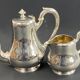 Silver-plated coffee pot and milk jug monogrammed MA, signed CHRISTOFLE.