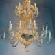 Venetian chandelier in gilded Murano glass, 24 light sources, three tiers, circa 1940.